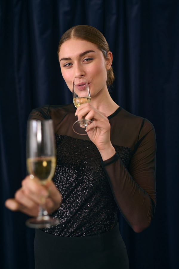 MELIDA BLÚSSA